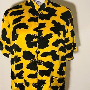 Brand-new stylish blouse in black and yellow.